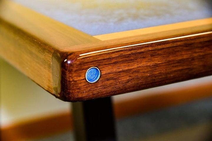 Epoxy resin bartop finish with brass pin detail
